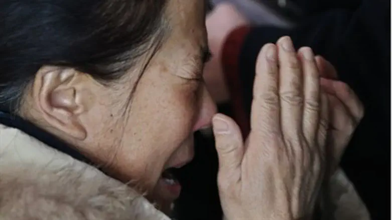 Relative of missing people from Malay plane.