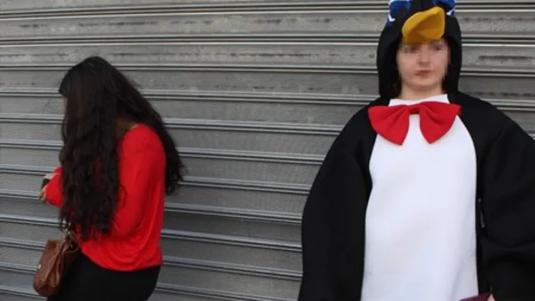 Young women in Purim costumes.
