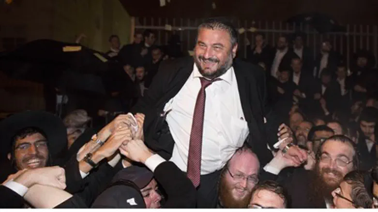 Incumbent Mayor Moshe Abutbul celebrates with