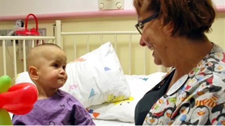 Baby Tima with Raheli Geva, Nursing Director