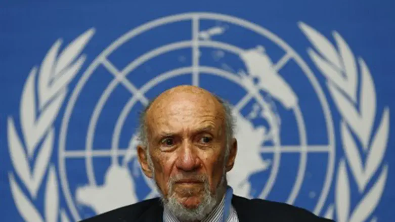 Richard Falk addresses a news conference on M