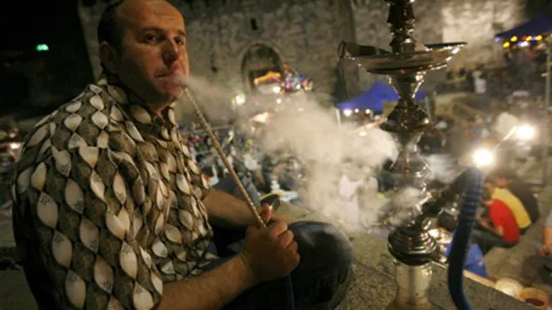 Nargila water-pipe smoker (illustration)