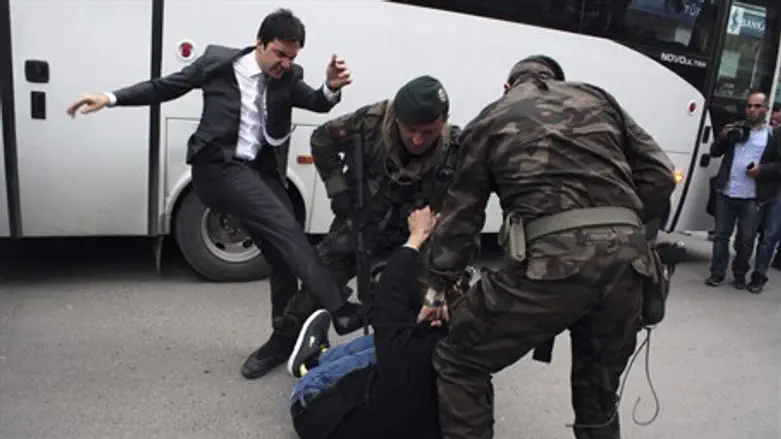 Yusuf Yerkel kicks protester