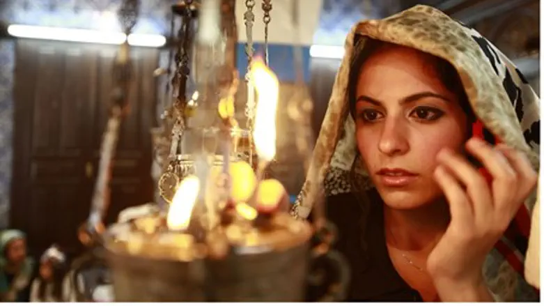 A Jewish worshiper prays during the pilgrimag