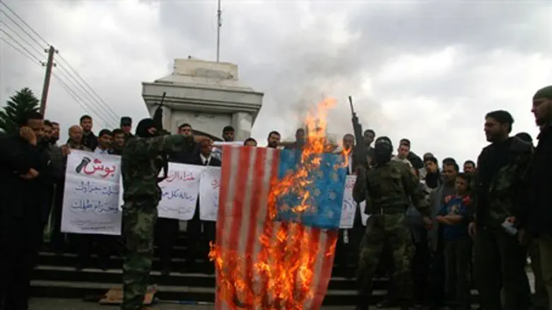 Negotiating? Hamas terrorists burn an America