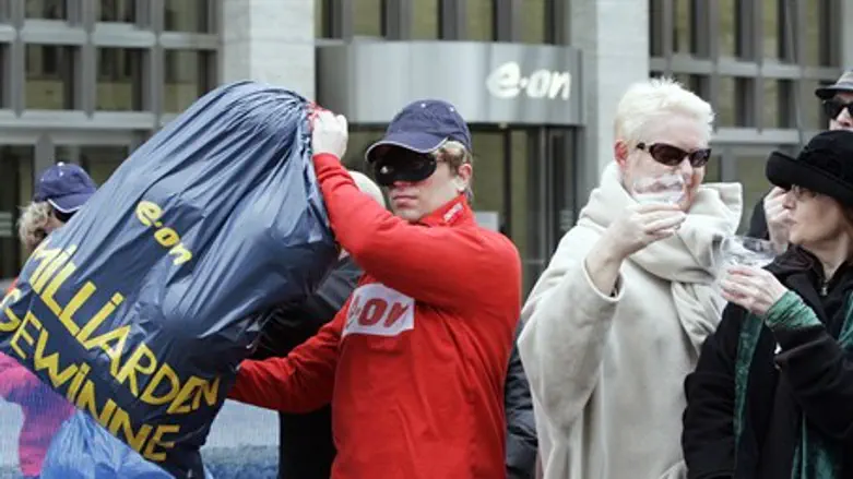ATTAC activists during 2008 protest outagains