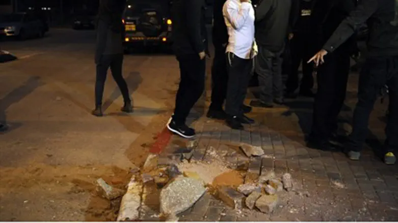 Hole caused by a rocket fired from Gaza