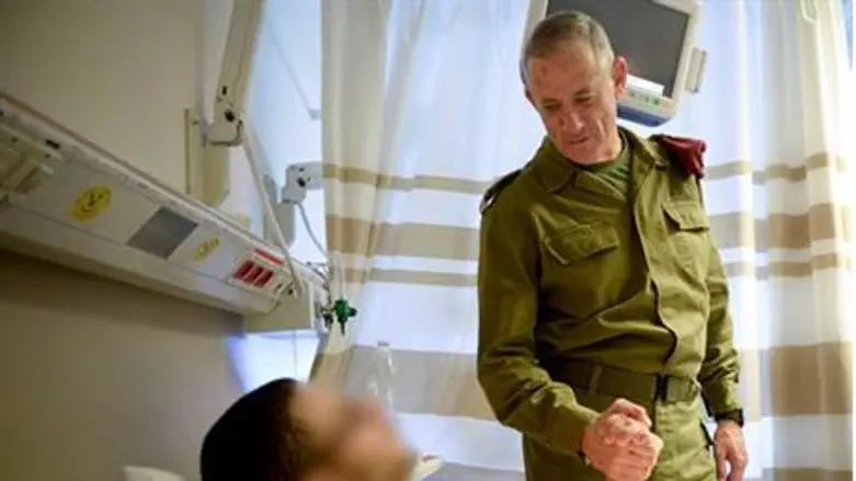 IDF head Benny Gantz meets injured soldier at