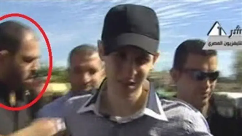 Attar (circled) seen with kidnapped IDF soldi