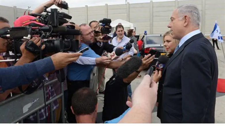 Prime Minister Netanyahu talks to reporters b