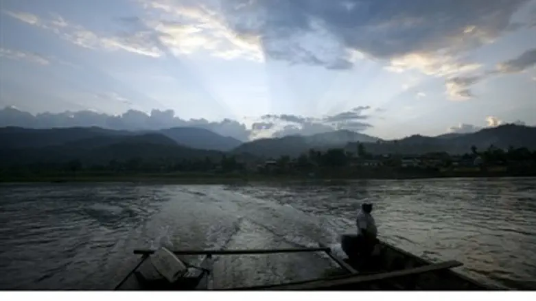 Boat crosses Peru's Apurimac River