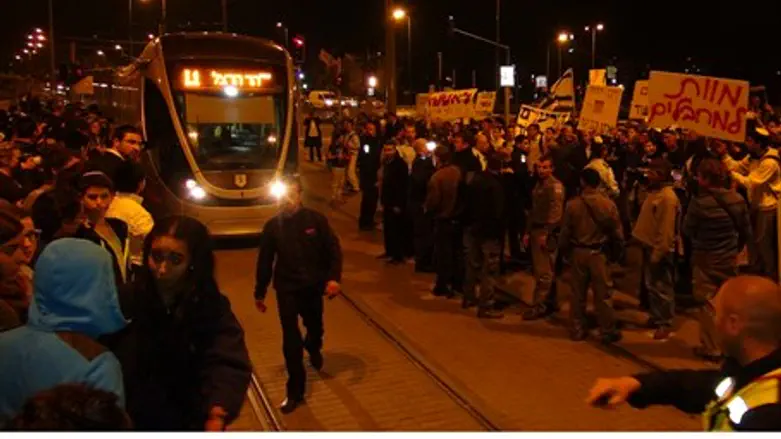 Protest at scene of murder