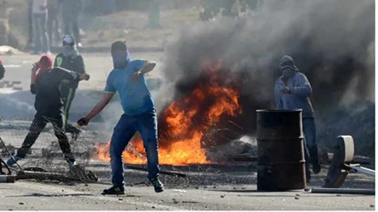 Rioters clash with police in Kafr Kana, north
