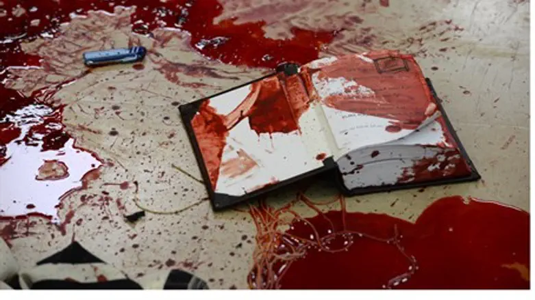 Bloodied prayer book in Har Nof attack (file)