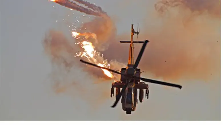 Apache helicopter releases flares