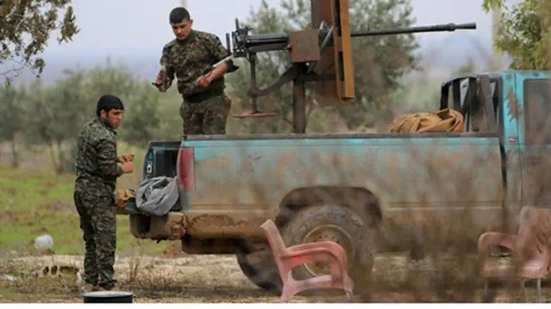 Kurdish YPG fighters on the frontline against ISIS in Ras al-Ain, northern Syira