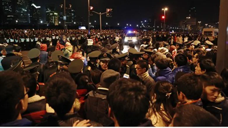 Police control site after stampede
