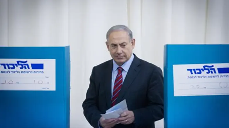 Prime Minister Binyamin Netanyahu votes in Likud primaries
