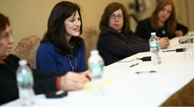 Anne Neuberger (second from left)