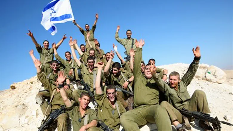 IDF soldiers celebrate with flag