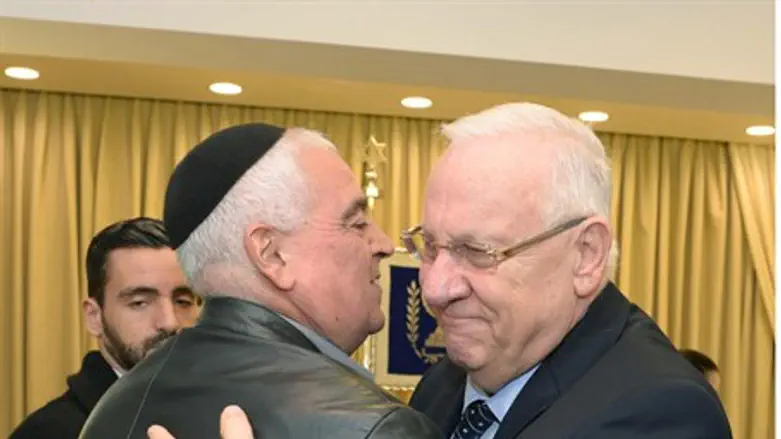 Rivlin with victims' families