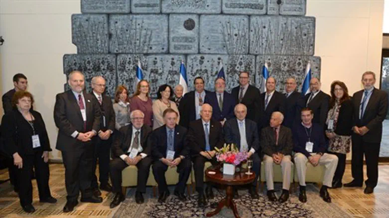 ריבלין בצילום משותף עם חברי ועידת הנשיאים