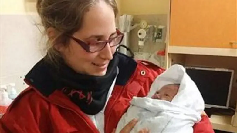 Aluma Simon with the newborn baby