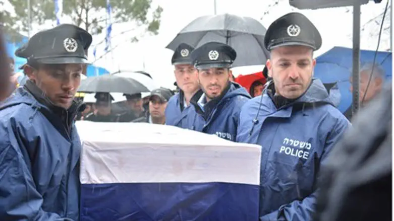 Colleagues lay Police Sergeant Ofer Kenerick to rest