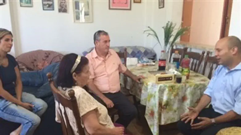 Bennett (L), Tamam family.