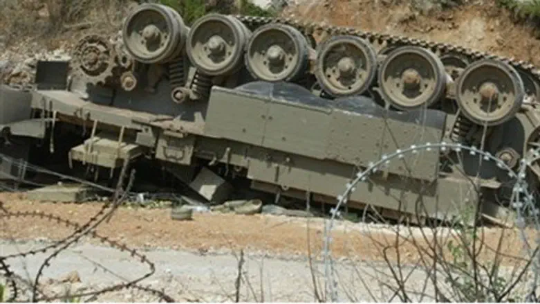 Overturned APC in Kfar Adumim