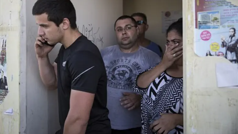 Israelis take cover in rocket shelter
