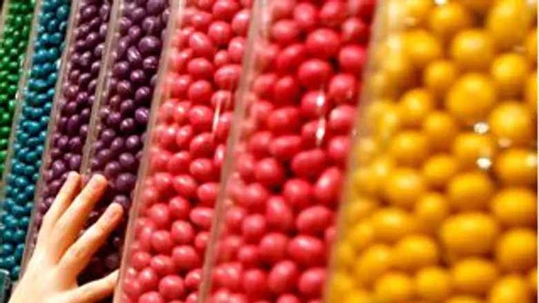 פיתוי כלכלי וחברתי. סוכריות ליד הקופות