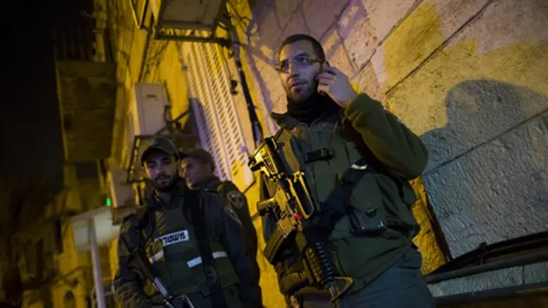 Police at the scene of the stabbing in Jerusalem