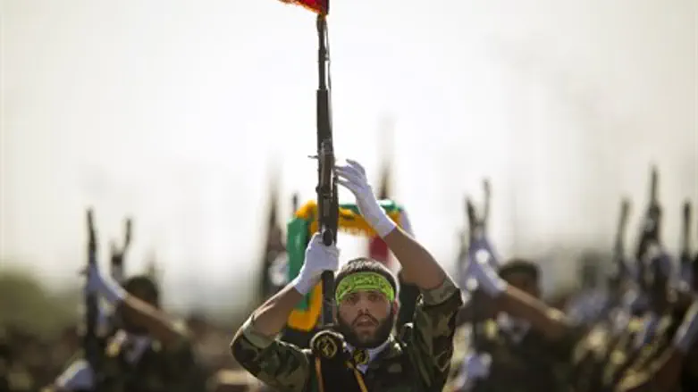 Members of Iran's Basij paramilitary force march in Tehran (file)