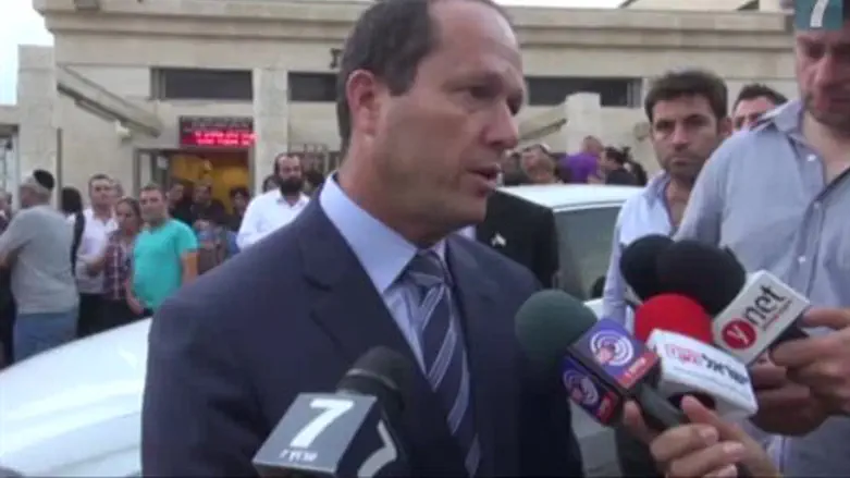 Jerusalem mayor Nir Barkat leaves funeral