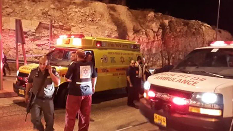 Paramedics and soldiers at the site of the attack