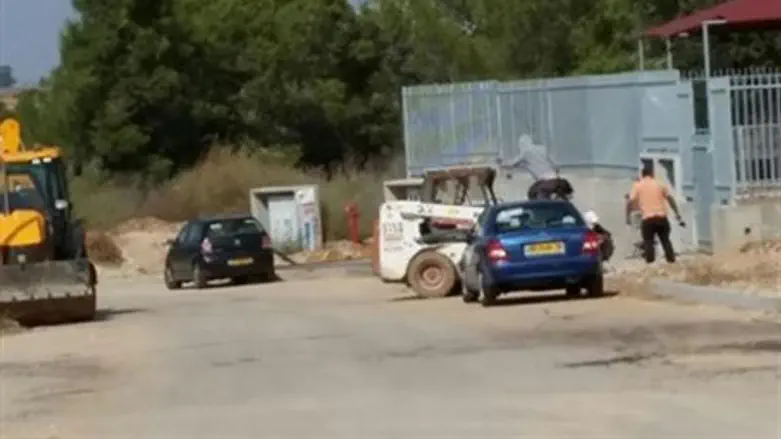 Arab construction workers adjacent to kindergarten with no security