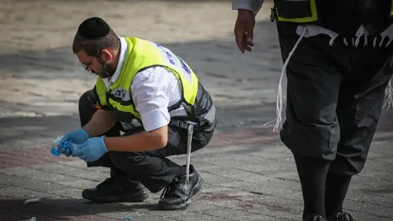 Medics at stabbing site (file)