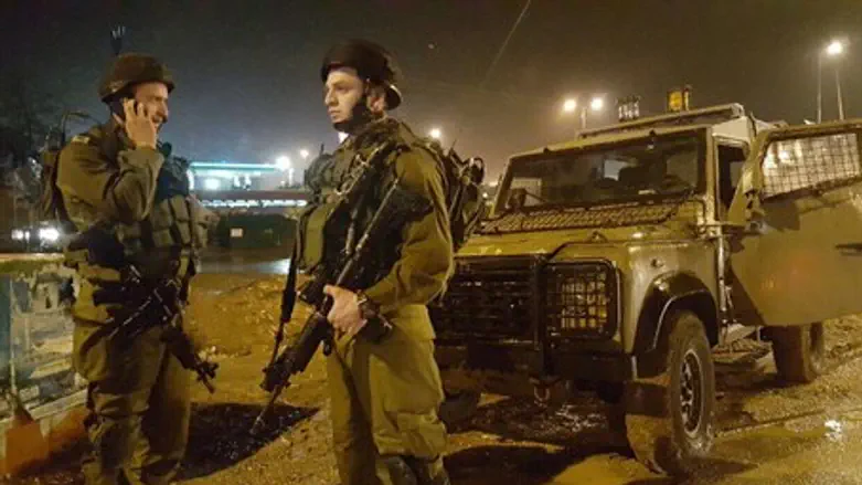 Shimshon Brigade soldiers at the site of the stabbing