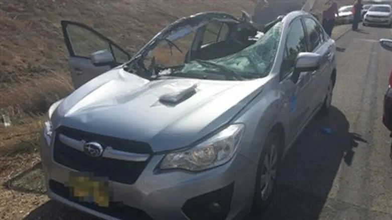 The car that was hit by a wheel.