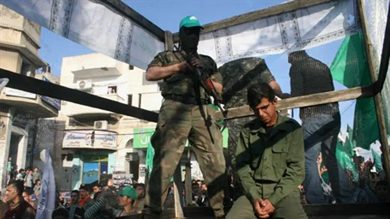 Palestinian demonstration showing caged 'prisoner'