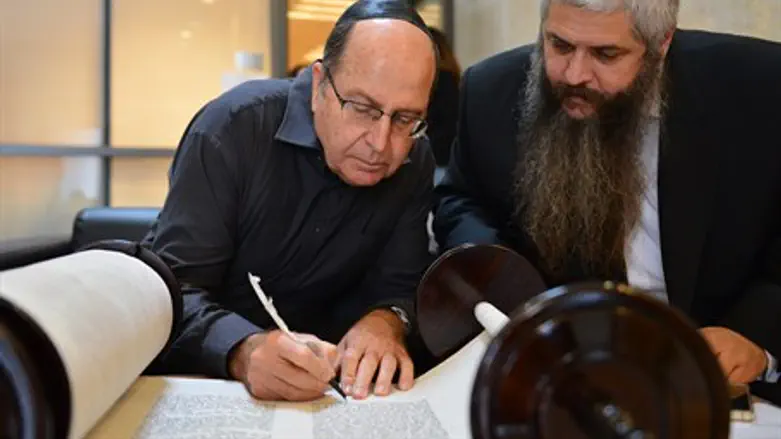 שר הביטחון והרב אסמן