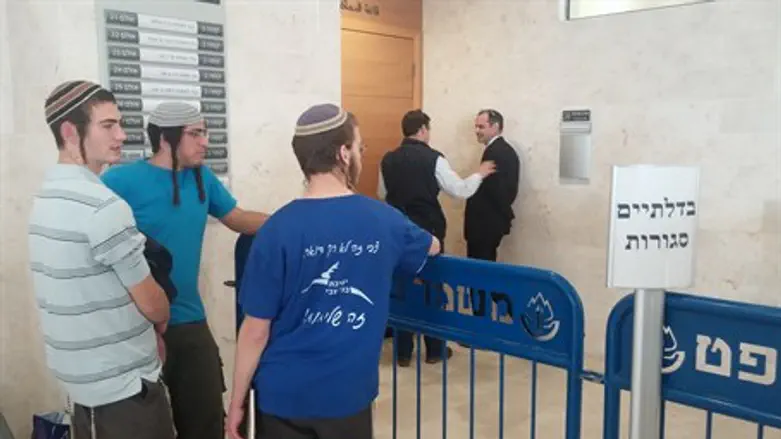 Friends of detainees protest outside courtroom (file)