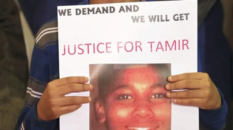 Boy holding sign in support of Rice
