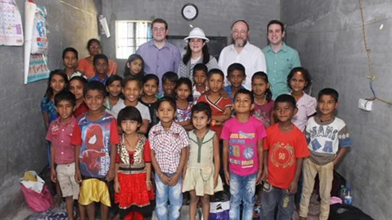 Chief Rabbi and family at GPM project for children in Mumbai slums 