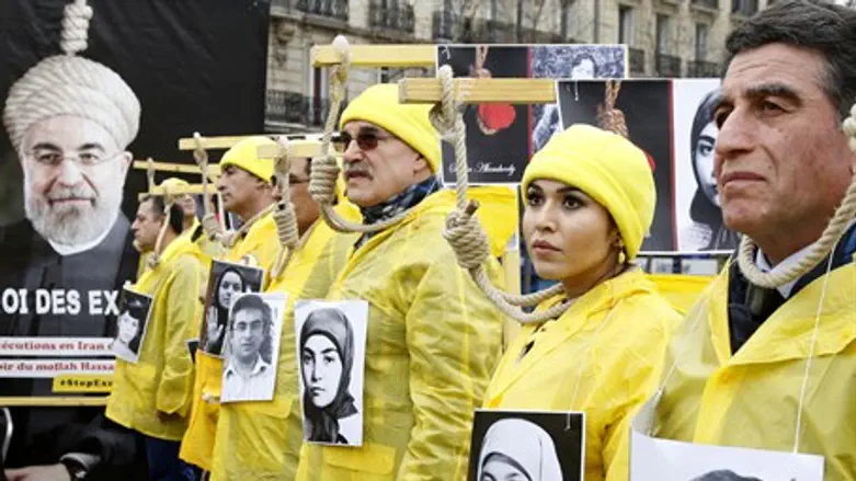 French protest Iran's Hassan Rouhani