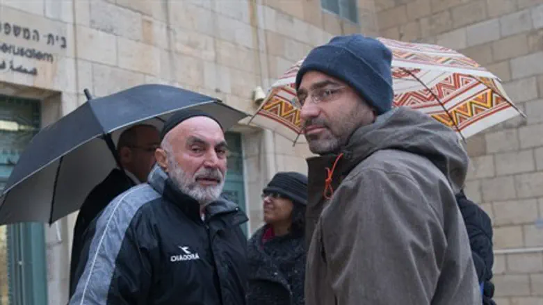 Ezra Nawi (L), Guy Butavia