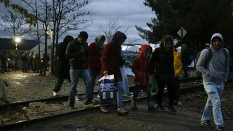 Immigrants crossing border in Europe (illustration)