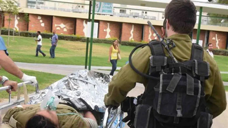 Injured soldier being transported to hospital (illustrative)