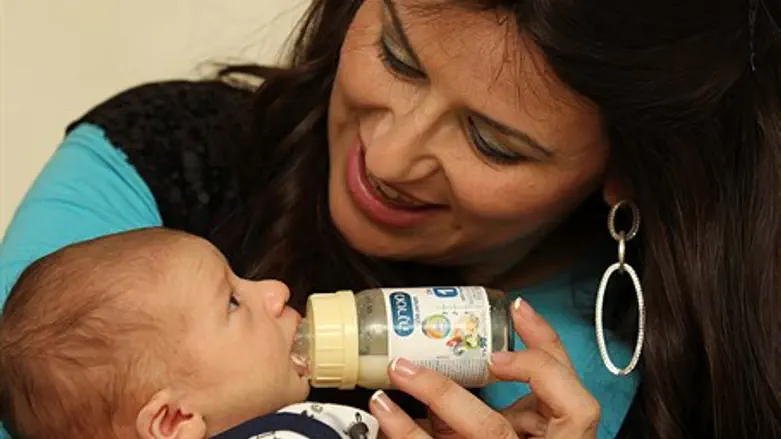 Mother with baby (illustrative)